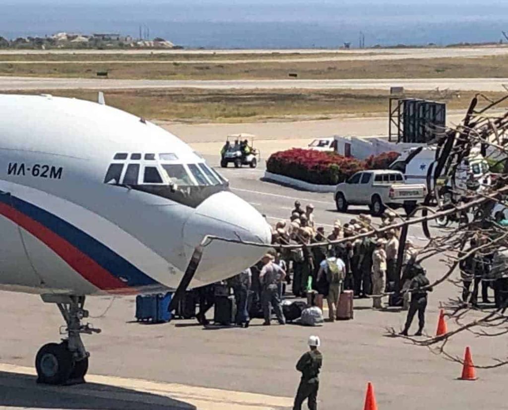 Russia sends two military planes to Venezuela as tensions escalate between Washington & Moscow